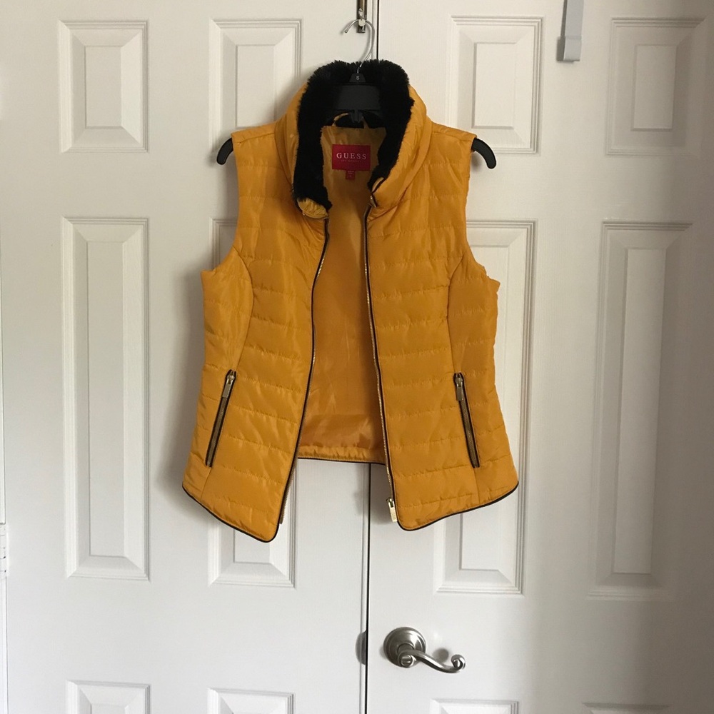 Guess Women's Gold/Amber Puffer Vest with soft black faux fur collar.